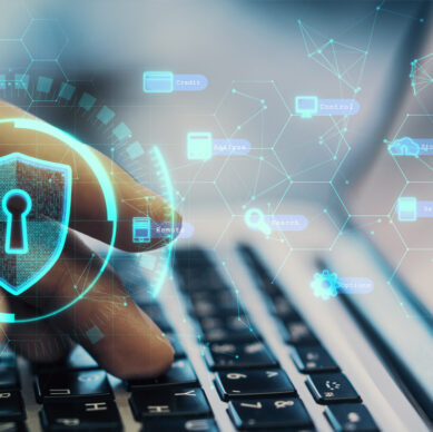 Information security professionals reviewing cybersecurity and data protection procedures in an office environment