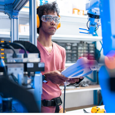 Engineering and quality professionals reviewing failure analysis and risk assessment procedures in a manufacturing environment