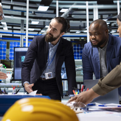 Risk management auditor reviewing operational risk assessment procedures in a corporate environment