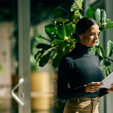 Internal safety auditor conducting a workplace compliance inspection at an industrial facility