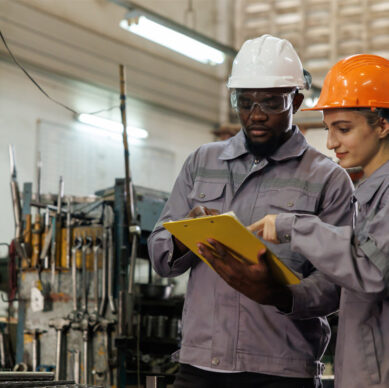 Certification system auditor reviewing compliance and audit procedures in a corporate environment